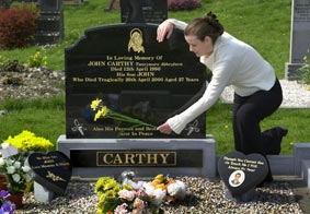 Mary Carty on her brother's grave